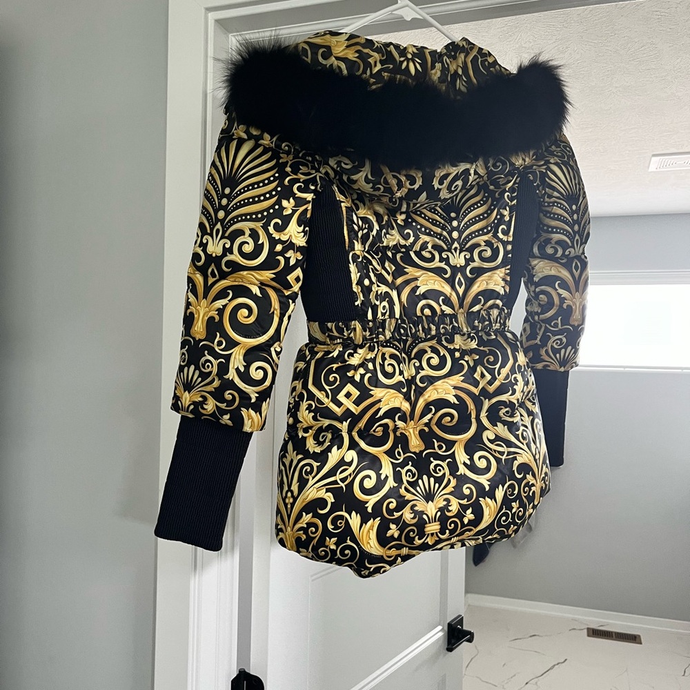 Stylist Versace jacket made out of polyester good for a night out